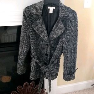 Tie at waist jacket.